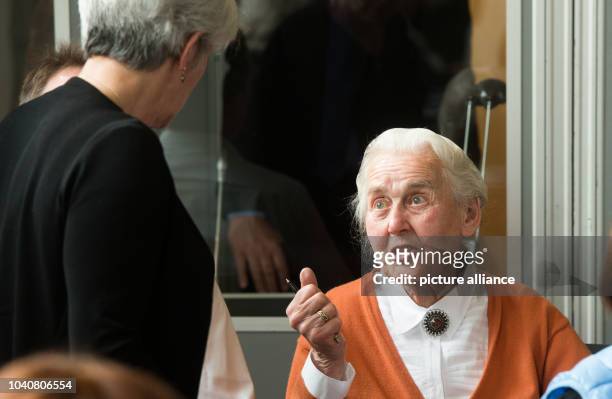 Ursula Haverbeck-Wetzel , convicted Holocaust denier, talks to Ruth De Vries, daughter of the joint plaintiff Erna de Vries during a session of the...