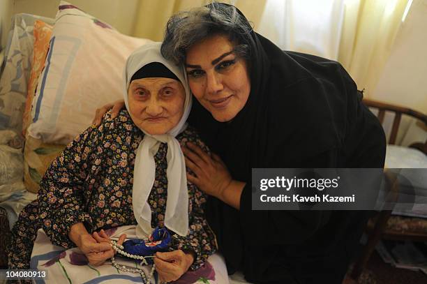 July 9, 2010: Maryam Khatoon Molkara photographed with her mother at home in Karaj city outside Tehran. Maryam Khatoon Molkara formerely a male,...