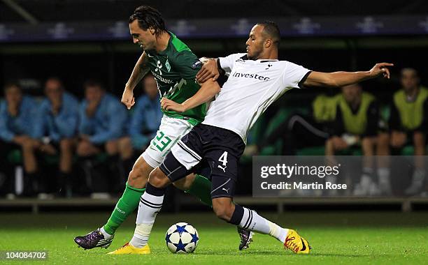 Hugo Almeida of Bremen and Younes Kaboul of Tottenham compete for the ball during the UEFA Champions League group A match between SV Werder Bremen...