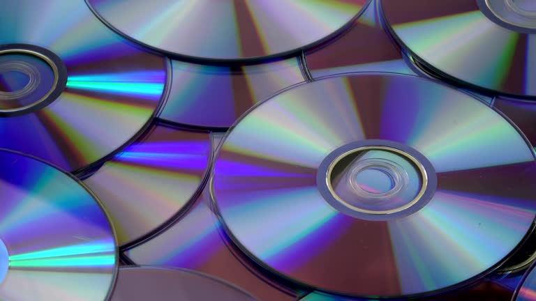 Rotating DVD and CD compact discs background 동영상 (1040865342) - 게티이미지뱅크
