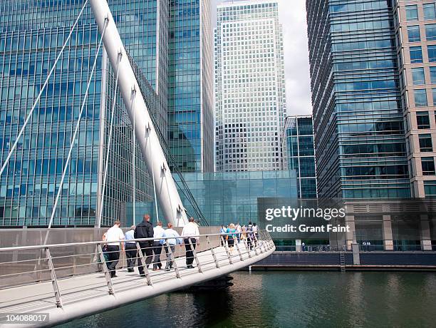 view of office workers walking - voetgangersbrug stockfoto's en -beelden