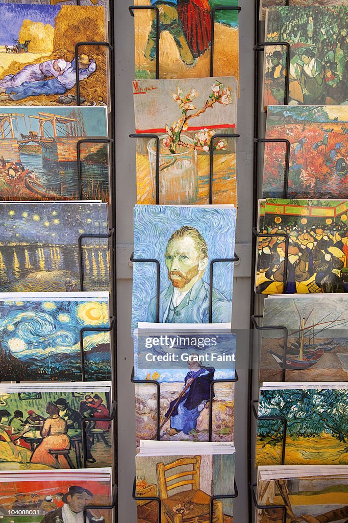 Rows of postcards in shop.