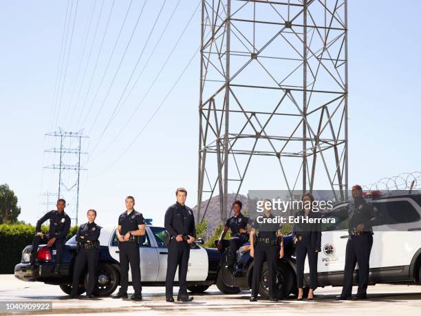 Walt Disney Television via Getty Images's "The Rookie" stars Titus Makin as Jackson West, Melissa O'Neil as Lucy Chen, Eric Winter as Tim Bradford,...