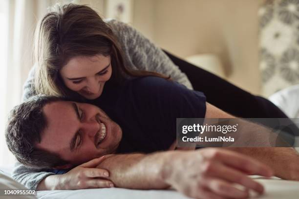 mix friendship with romance and you get love - rough housing imagens e fotografias de stock