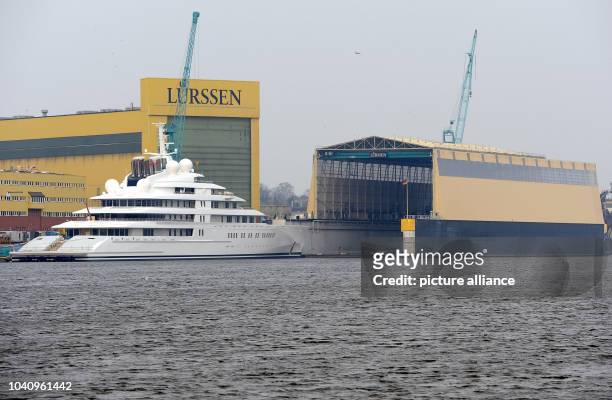 The longest luxury yacht in the world, the 180m long 'Azzam', is visible at the Luerssen shipyard after being undocked in Bremen, Germany, 09 April...