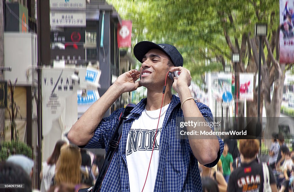 The young man listening to music