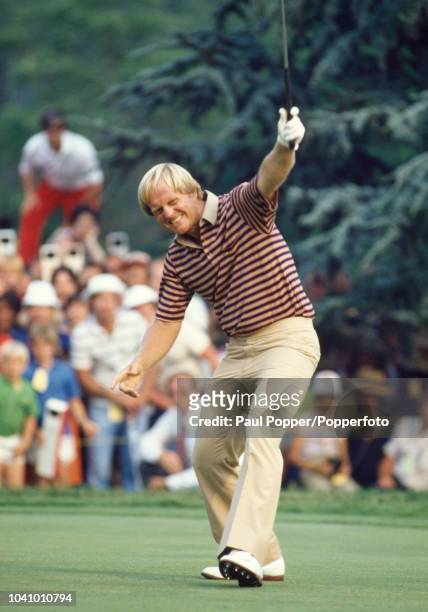 American professional golfer Jack Nicklaus holes a putt on the 17th green prior to finishing in first place to win the 1980 US Open golf championship...