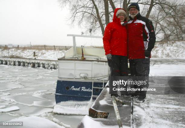 Islanders Conrad Marlow and his wife Ulla Toth pose for photos on the Baltic Sea Island Ruden, Germany, 19 March 2013. The couple defies cold and...