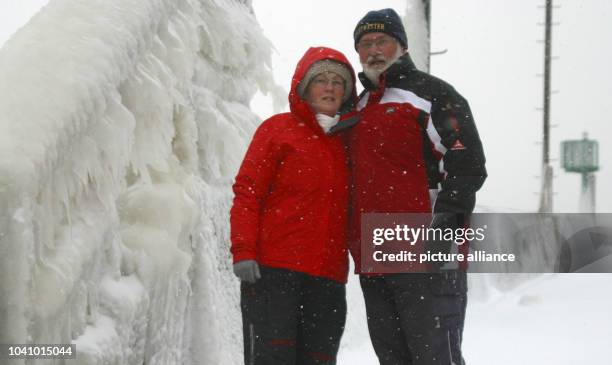 Islanders Conrad Marlow and his wife Ulla Toth pose for photos on the Baltic Sea Island Ruden, Germany, 19 March 2013. The couple defies cold and...