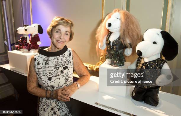 Jeannie Schulz, widow of Snoopy creator Charles M. Schulz , poses during the opening of the the exhibition 'Snoopy and Belle in Fashion' as part of...