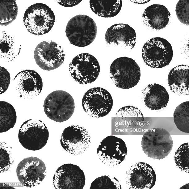 round uneven imperfect unfinished dirty black stamps on white paper card - seamless polka dot pattern in vector - uneven stock illustrations