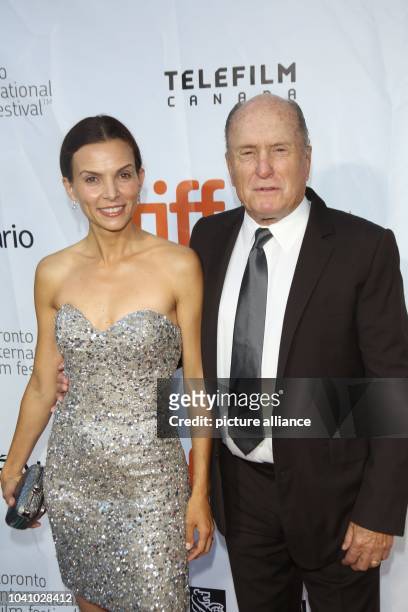 Actor and cast member Robert Duvall and his wife Luciana Pedraza attend the premiere of the movie 'The Judge' during the 39th annual Toronto...