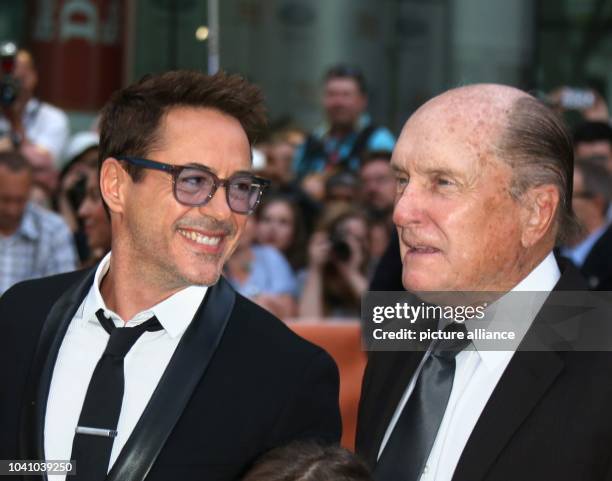Actors and cast members Robert Downey Jr., and Robert Duvall attend the premiere of the movie 'The Judge' during the 39th annual Toronto...