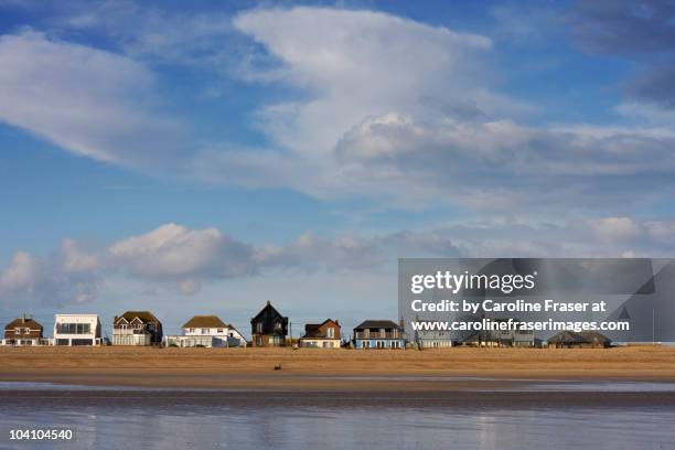 beach houses, camber sands - rye stock pictures, royalty-free photos & images