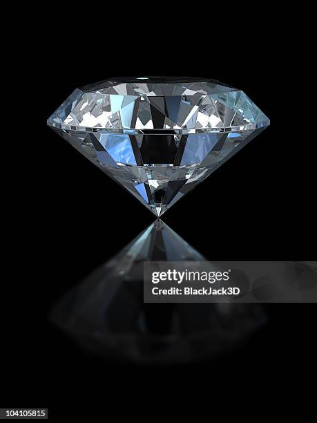 large diamond with reflection set against black background - diamond stockfoto's en -beelden