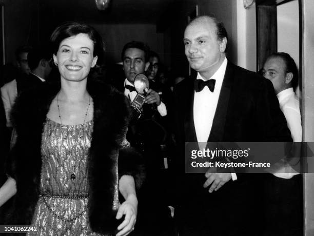 Delphine Seyrig et Francesco Rosi à leur arrivée à la Mostra de Venise, Italie, le 7 septembre 1963.