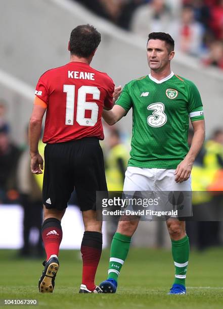 Cork , Ireland - 25 September 2018; Robbie Keane of Republic of Ireland & Celtic Legends, right, and Roy Keane of Manchester United Legends during...
