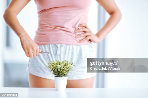 things can get bushy down there - pubic hair young women stock pictures, royalty-free photos & images