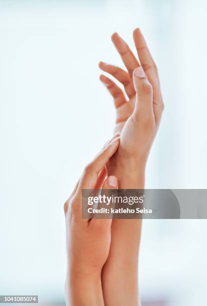 just touch it - hand cream stock pictures, royalty-free photos & images