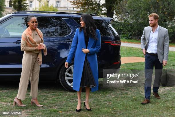 Meghan, Duchess of Sussex arrives with her mother Doria Ragland and Prince Harry, Duke of Sussex to host an event to mark the launch of a cookbook...