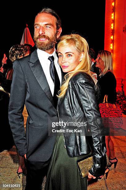 Hair Stylist/ photographer John Nollet and actress Emmanuelle Beart attend the 36th Deauville Film Festival - Opening Dinner at the Casino on...