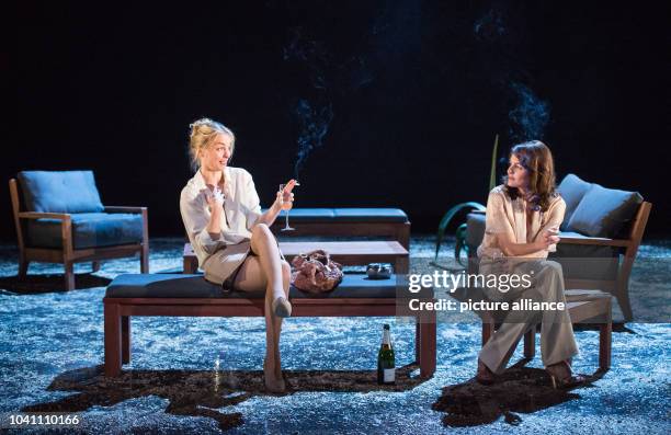 Nina Hoss and Stephanie Eidt perform on stage during the photo rehearsal of the play 'Bella Figura' in the theatre at the Lehniner square in Berlin,...