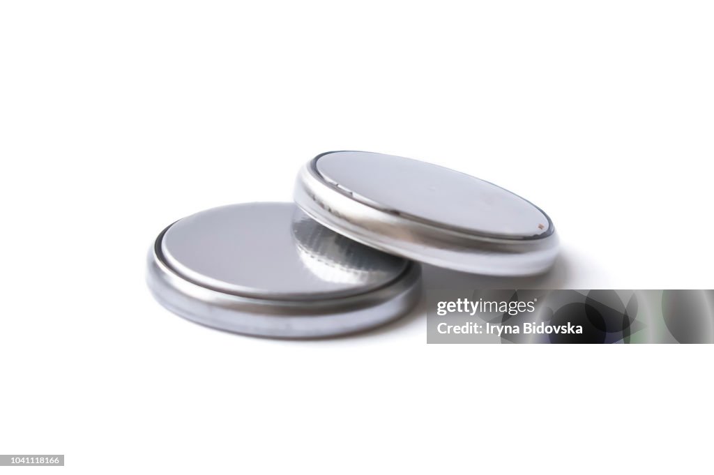 Small flat lithium batteries isolated on a white background