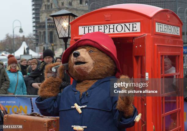 Paddington Bear stands on the red carpet before the premiere of the movie "Paddington" at Zoopalast cinema in Berlin, Germany, 30 November 2014....