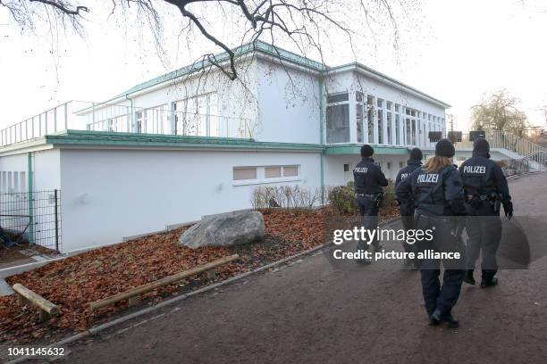 Policemen control the area at the Germania rowing club at the Alster river in Hamburg, Germany, 5 December 2016. The OSCE Ministerial Council Meeting...