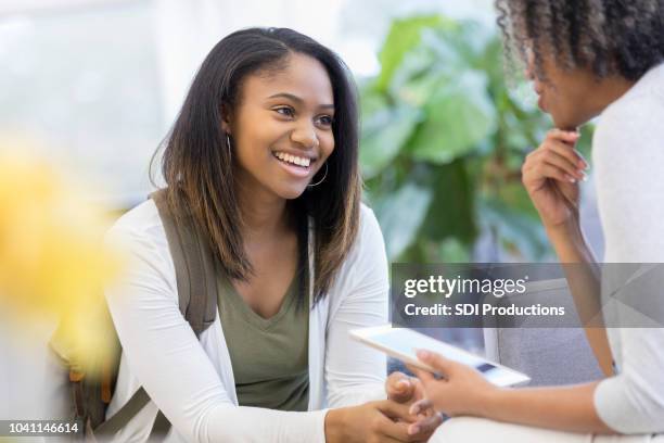 school counselor talks with high school student - patient education stock pictures, royalty-free photos & images