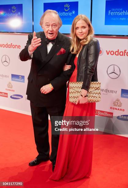 René Kollo and his daughter Florence arrive at the 50th Golden Camera Award show in Hamburg, Germany, 27 February 2015. Photo: Georg Wendt/dpa |...