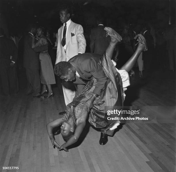 Swing dancing at the Savoy Ballroom in Harlem, New York, 1947.