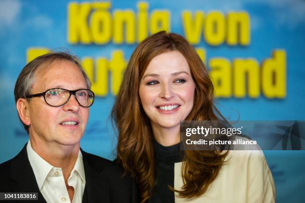 The protagonsits Katrin Bauerfeind and comedian Olli Dittrich arribe for the premiere of their movie 'Koenig von Deutschland' at the Kino...