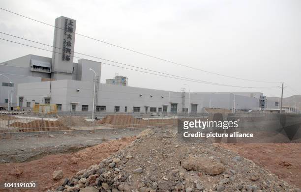 Rubble outside of the new Volkswagen factory in Urumqi, China, 07 April 2014. Volkswagen has come up against an ethnic conflicts with the opening of...