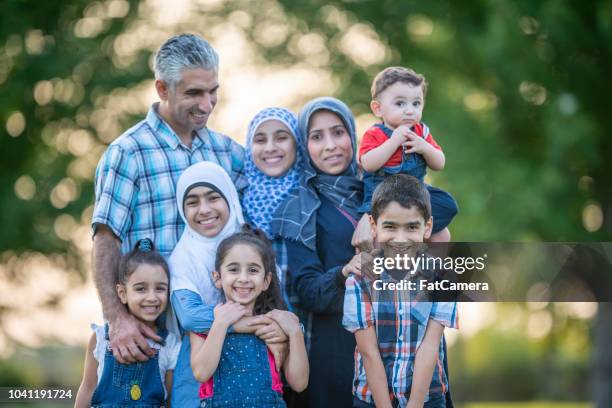 large muslim family - syrian culture stock pictures, royalty-free photos & images
