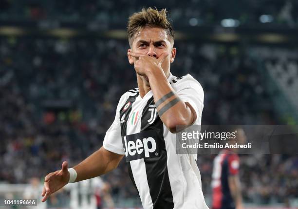 Paulo Dybala of Juventus FC celebrates after scoring the opening goal during the Serie A match between Juventus and Bologna FC at Allianz Stadium on...