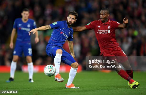 Cesc Fabregas of Chelsea controls the ball as Daniel Sturridge of Liverpool looks on during the Carabao Cup Third Round match between Liverpool and...