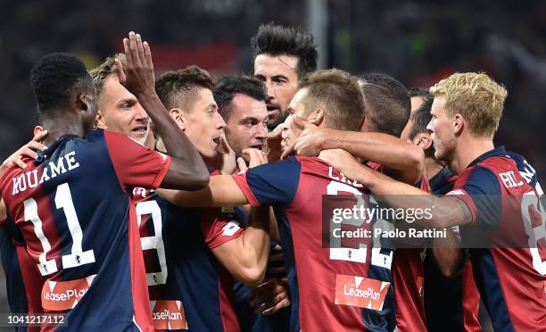 Krzysztof Piatek of Genoa celebrates with team-mates after scoring 1-0 during the serie A match between Genoa CFC and Chievo Verona at Stadio Luigi...