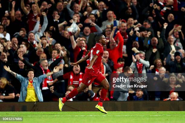 Daniel Sturridge of Liverpool celebrates after he scores his sides first goal during the Carabao Cup Third Round match between Liverpool and Chelsea...