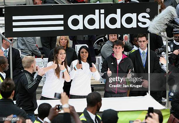 Adidas bring footballer Lionel Messi to a market stall in London for an unannounced boot amnesty promoting the adidas F50 adizero football boot on...