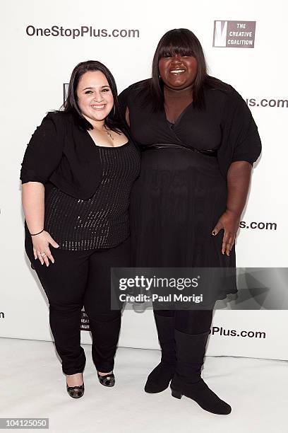 Nikki Blonsky and Gabourey Sidibe pose for a photo at the Onestopplus.com Spring 2011 fashion show during Mercedes-Benz Fashion Week at Frederick P....