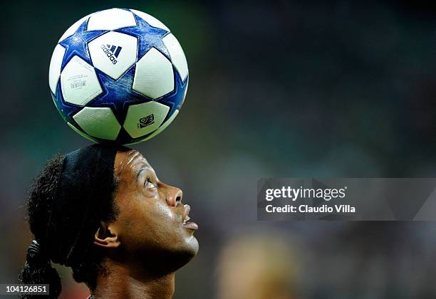 Ronaldinho of AC Milan controls the ball with his head during the UEFA Champions League group G match between AC Milan and Auxerre at San Siro...