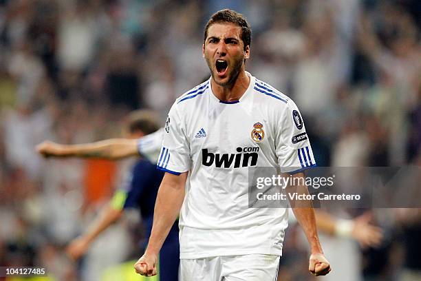 Gonzalo Higuain of Real Madrid celebrates after scoring during the UEFA Champions League Group G match between Real Madrid and Ajax, at Estadio...