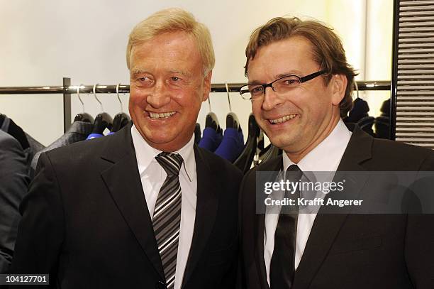 Ole von Beust , former first major of Hamburg, and Claus Strunz pose during the Giorgio Armani And Emporio Armani Shop Opening Cocktail on September...