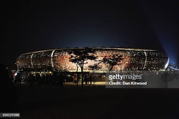 Fans leave the Soccer City stadium after the 2010 World Cup group A first round football match between Mexico and South Africa which ended as a 1-1...