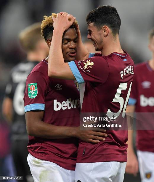 Grady Diangana of West Ham United celebrates scoring his second goal with Joe Powell during the Carabao Cup Third Round match between West Ham United...