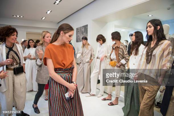 Olivia Palermo and models are seen at the Brunello Cucinelli presentation during Milan Fashion Week Spring/Summer 2019 on September 19, 2018 in...