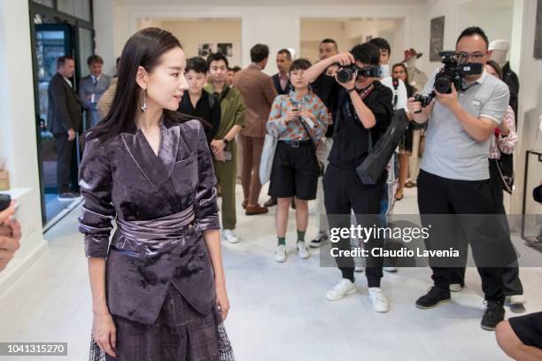 Dong Jie is seen at the Brunello Cucinelli presentation during Milan Fashion Week Spring/Summer 2019 on September 19, 2018 in Milan, Italy.