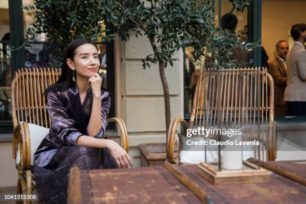 Dong Jie is seen at the Brunello Cucinelli presentation during Milan Fashion Week Spring/Summer 2019 on September 19, 2018 in Milan, Italy.