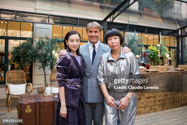 Dong Jie, Brunello Cucinelli and Angelica Cheung are seen at the Brunello Cucinelli presentation during Milan Fashion Week Spring/Summer 2019 on...